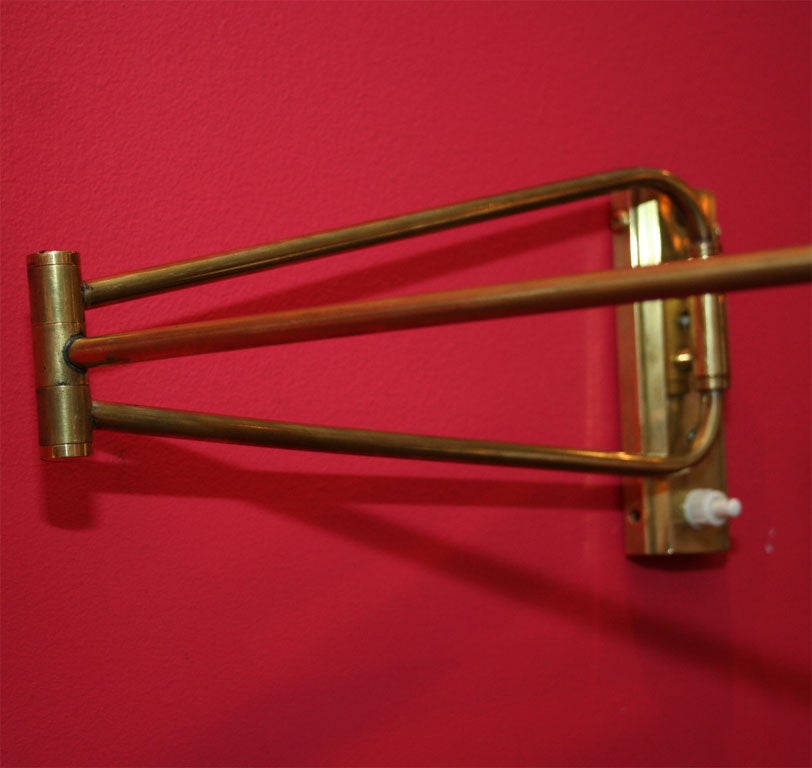 French Pair Of Lunel Swing Arm Sconces