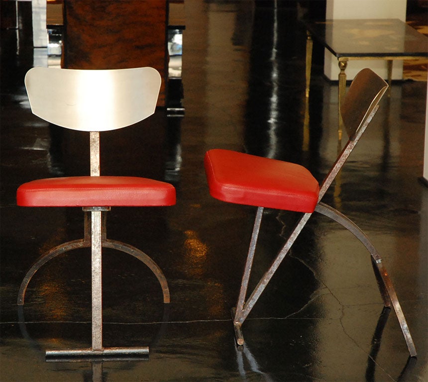Pair of sculptural modernist chairs from Germany, circa 1930s. Frame is in steel with a seat in red leather.