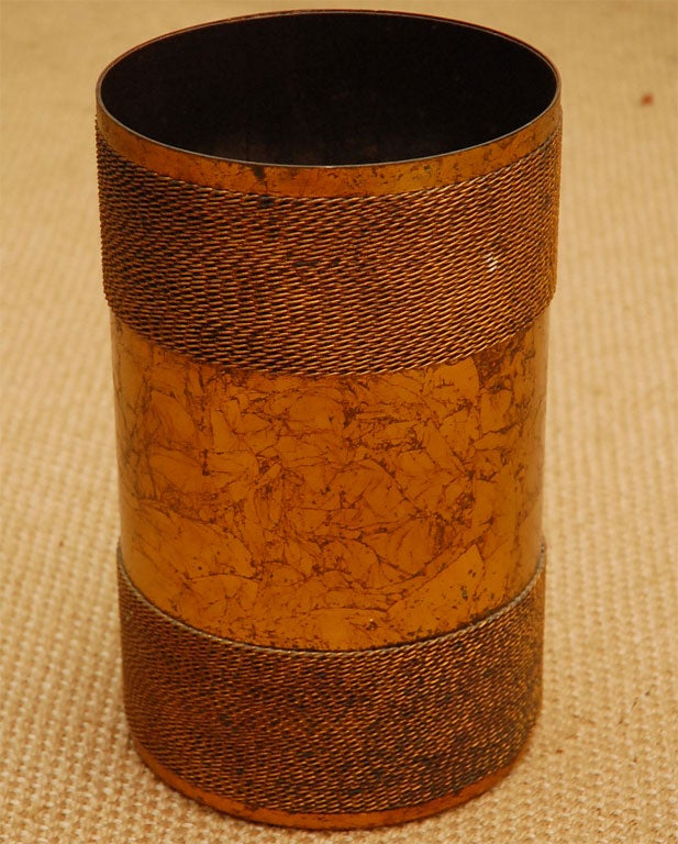 Gilt metal wastebasket in the style of Jean Royere