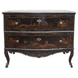 A painted, gilded and lacquered wood chest-of-drawers