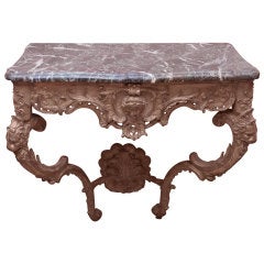 Carved and gilded wood and marble console table