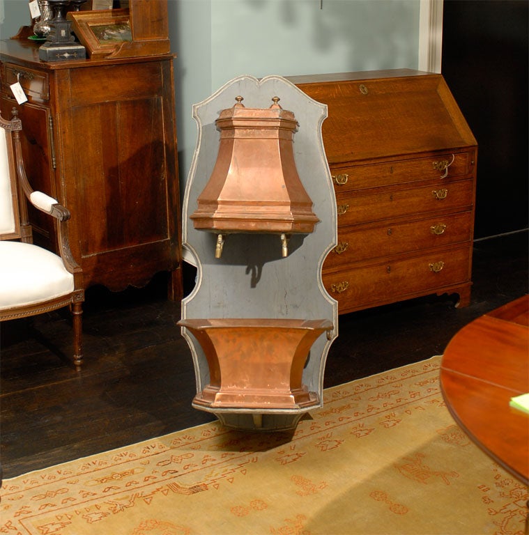 Late 18th/Early 19th Century Copper Octagonal Lavabo.  It is mounted on a later wall plaque.  The measurements are for the entire set mounted on the plaque.