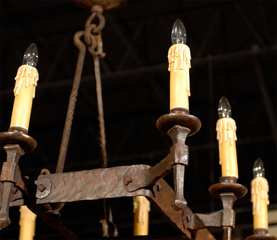 French 12 light iron chandelier<br />
<br />
To see more items from Foxglove Antiques, please visit our website: www.foxgloveantiques.com