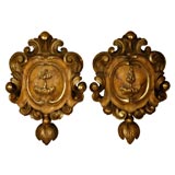 Pair of Italian faux marble crests