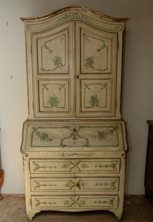 Pale green and silver and gold gilt, fall front secretary with a fully painted interior embellished with floral motifs.