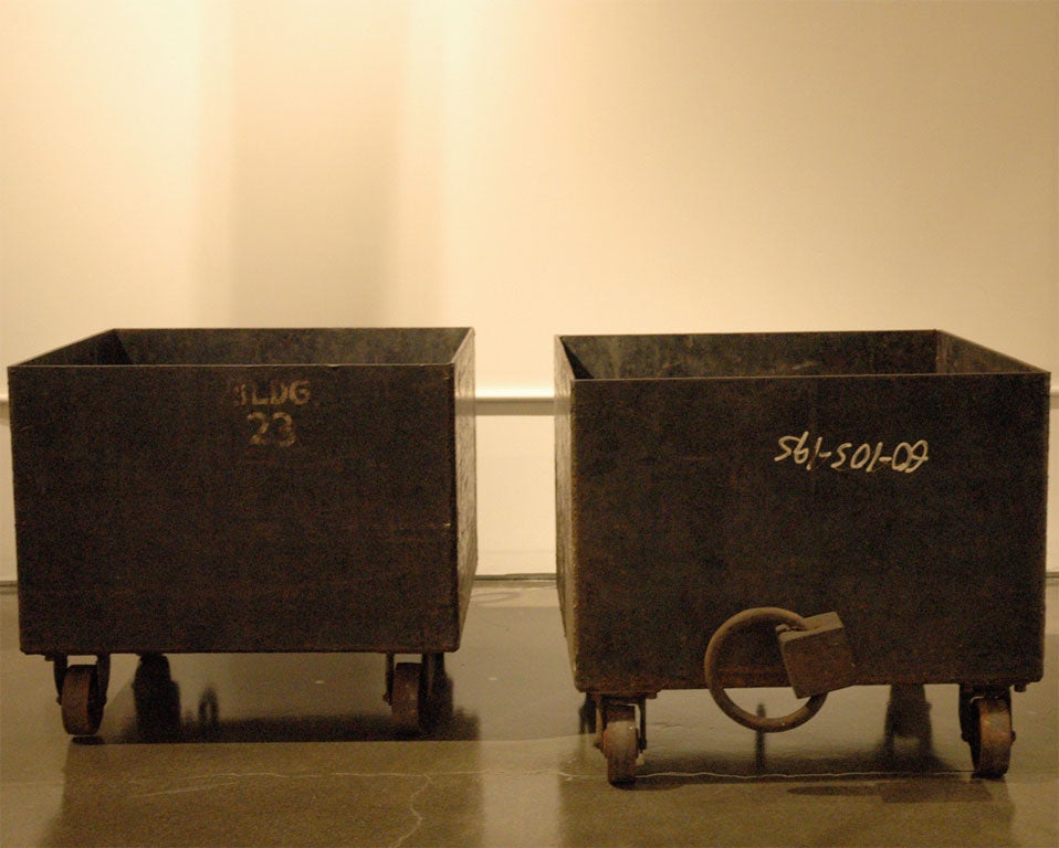 Set of two industrial steel boxes on wheels