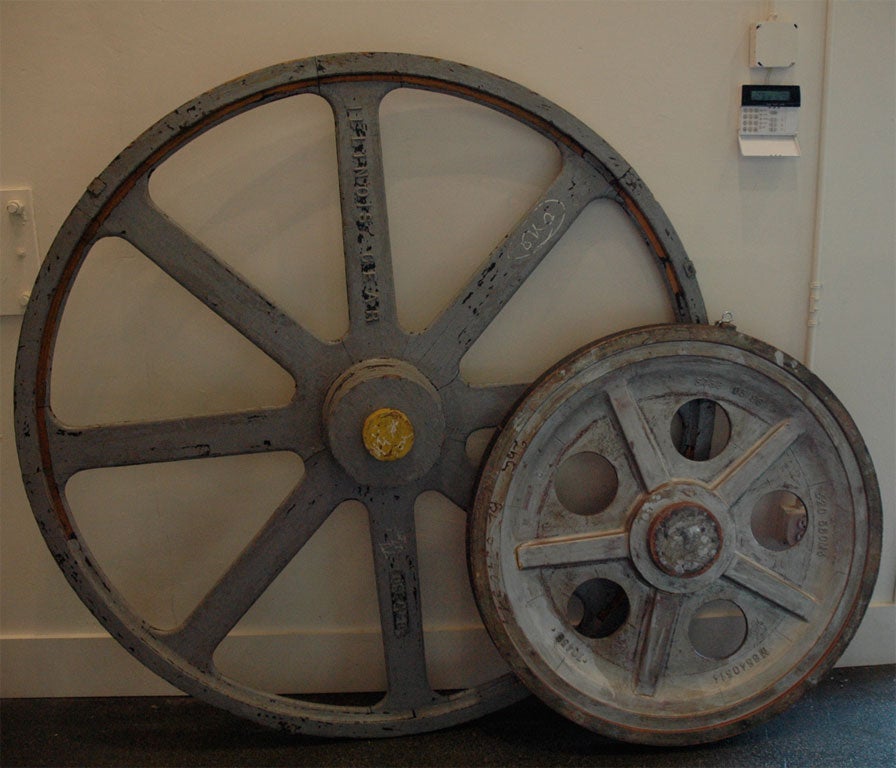 all wood and numbered original wheel molds sold as a set, original paint, large one ready for hanging as art.
