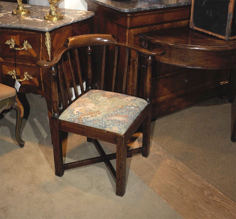 George III period oak corner chair made in England circa 1800.