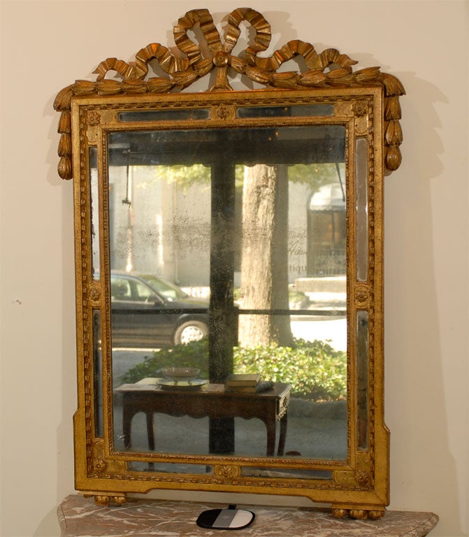 Carved French Louis XVI Style 19th Century Giltwood Mirror with Ribbon-Tied Swag Crest