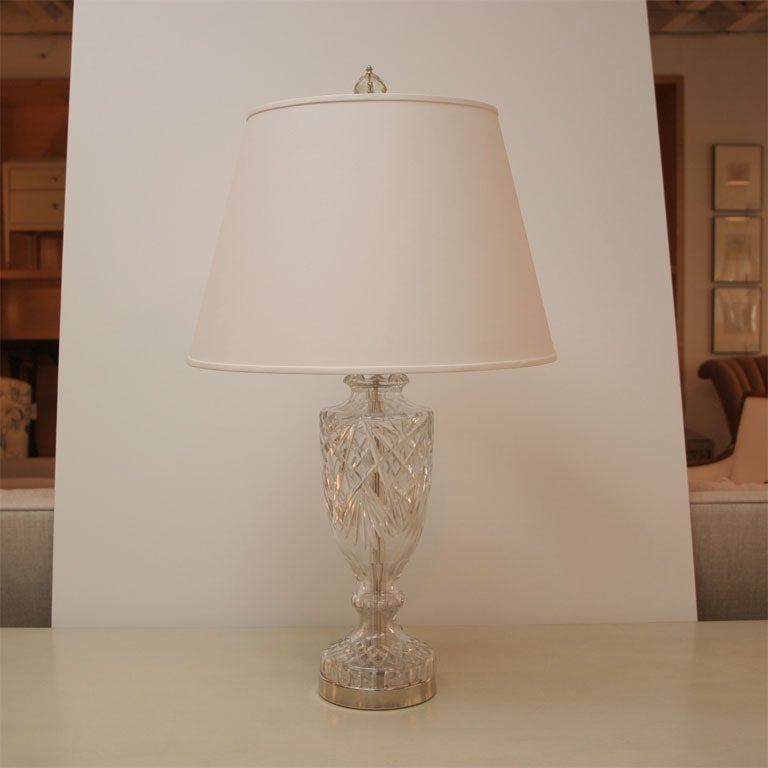 Two light table lamp with polished nickel base. White silk euro shade.