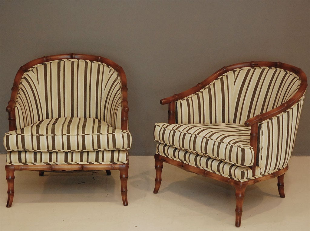 Pair of faux-bamboo barrel-back style Baker club chairs in original striped silk upholstery.