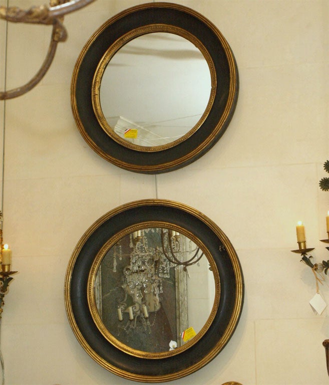 8237  A PAIR OF DIRECTOIRE STYLE ROUND MIRRORS