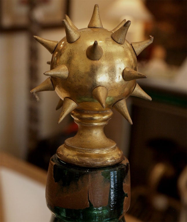 8211  A 19TH C MERCURY BOTTLE WITH FANTASY GILDED TOP