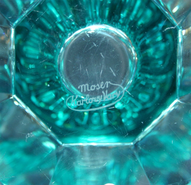 Crystal vase with geometric design<br />
in aqua marine. Signed Moser.