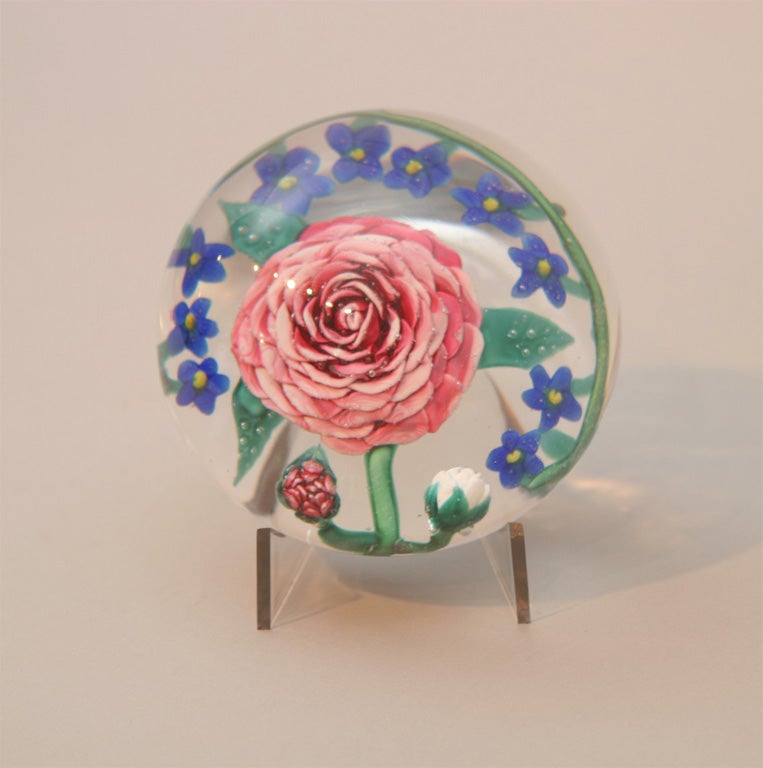 an important Mount Wasginton magnum rose bouquet paperweight, the large shaded central pink rose flanked by ten blue flowers, dimensional red ands white buds, unique presentation