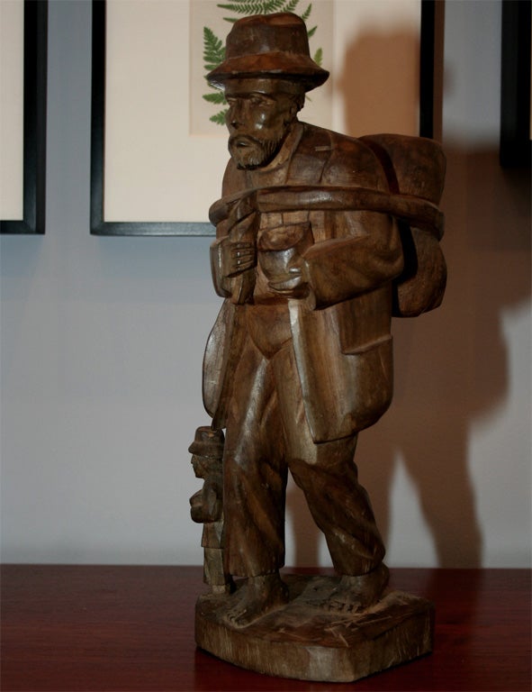 Figure of a man carved in Mahogany