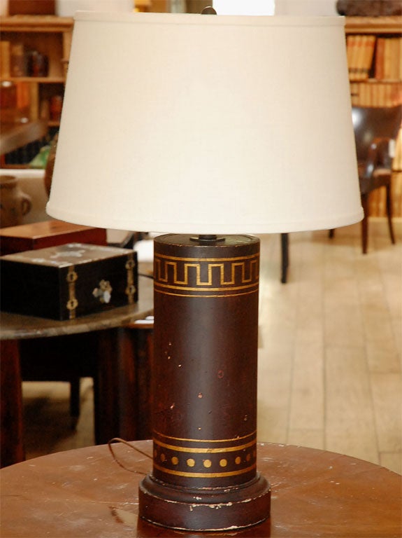 Early 19th-century English Regency painted tole lamp in chocolate brown, featuring a gilt Neoclassical Greek key motif. The simple lines and graphic accenting make this an eye-catching yet understated piece. Wired for use in the US, contact for