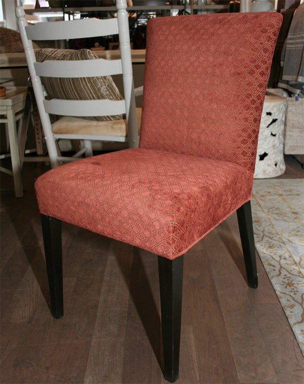 Set of four mahogany T.H. Robsjohn-Gibbings Dining Chairs by Widdicomb upholstered in Morocco Brick with contrast backs in Tahira Ottoman Claret, both designed by Thomas O'Brien for Lee Jofa