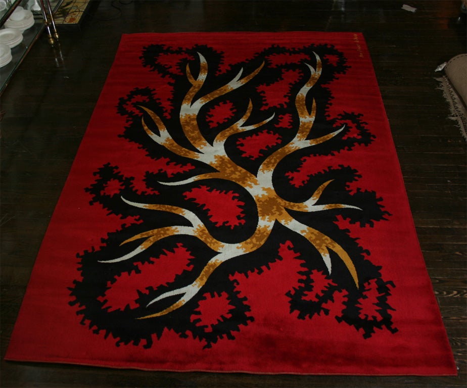Machine made red Axminster wool carpet with modernist design, signed, by Jean Picart Le Doux, French, 1950's.   Featured on The Marta Stewart Show.<br />
200 x 301 (cm)
