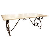 Cast iron, brass, travertine dining or console table