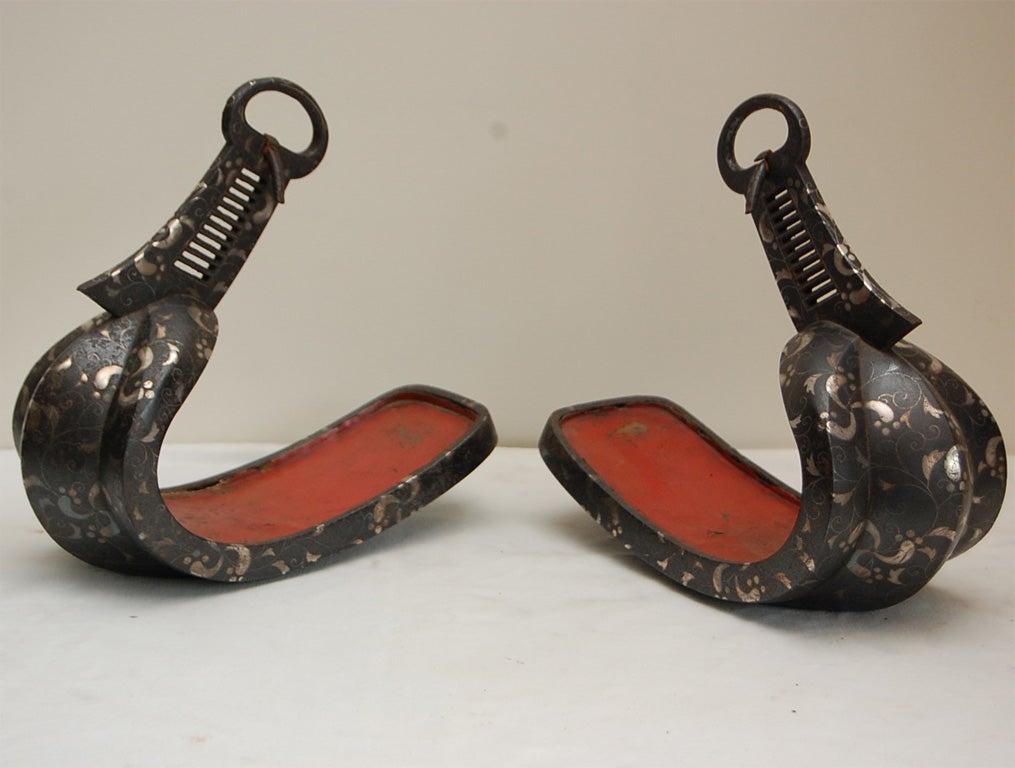 The bottoms of the stirrups have a cloud design with silver fine inlaid and shows somewhat wear which obviously had been used.  Signed Katsuo Nagatsugu who lived in Kanawaza.