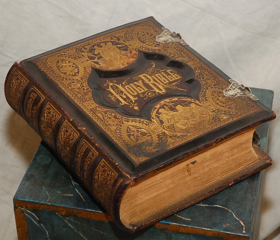 Incredible 19th century leather gold embossed bible with double metal clasps.  This family bible is filled with both color and  black & white templates (photos).  It is in excellent condition.
