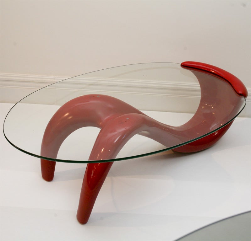 The anthropomorphic table; solid cast structure in red lacquered fiberglass with 1/2