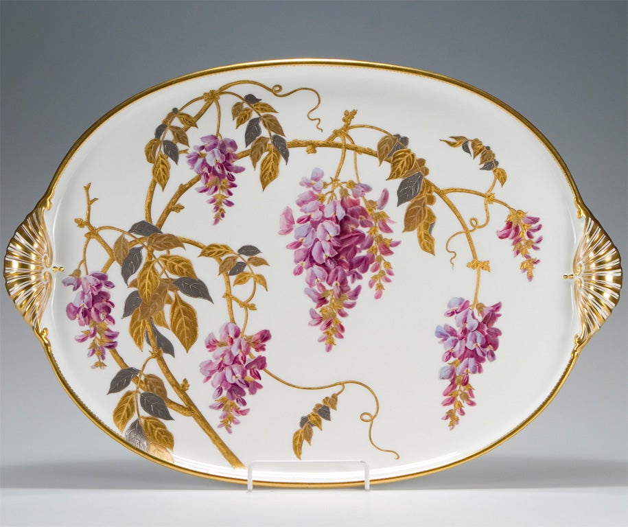 Large Minton porcelain tray with hand painted wisterias. Raised paste gold and platinum add depth and elegance to this rare example in amethyst and lavender palette. The handles are also hand painted in matching gold. Decorative and useful!!