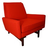 Jens Risom lounge chair with distinct shape and walnut base