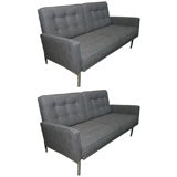 Pair of early Florence Knoll loveseats with steel bases