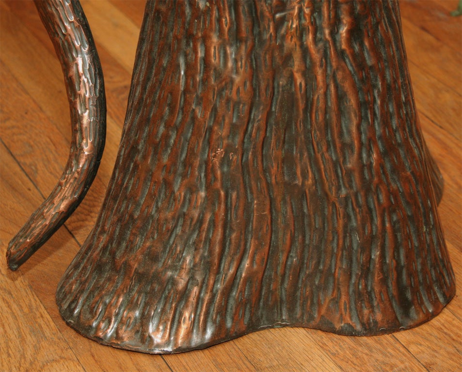 Patinated copper tree trunk umbrella stand