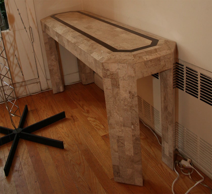 Tasselated stone console table by Maitland Smith