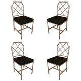 Set of four nickel finish faux bamboo upholstered chairs