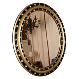 Painted black and gold leafed Irish mirror with faceted crystals
