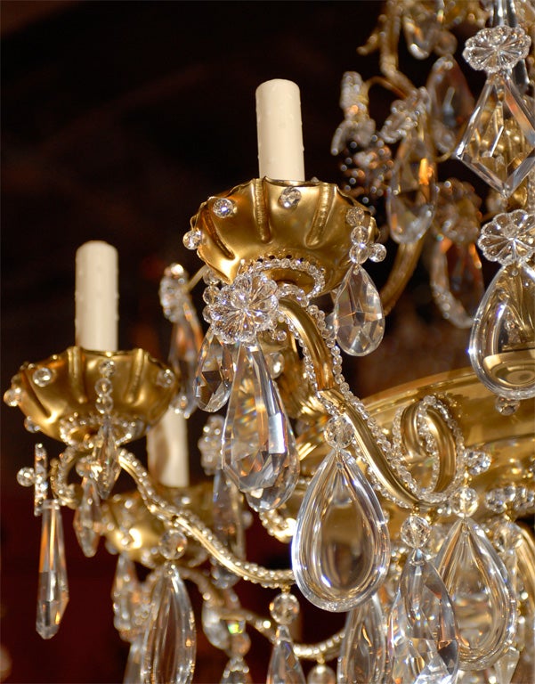 Fine Jansen chandelier of gilt bronze and crystal.