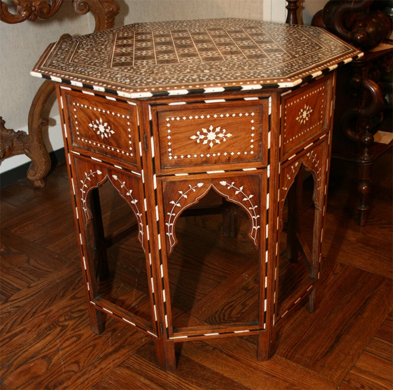 Superb Quality Large Ivory and Ebony Inlaid Octagonal Chess Table / End Table in Rich Foliate Design, Anglo India, Late 19th Century<br />
<br />
26 inches diameter x 24 inches high