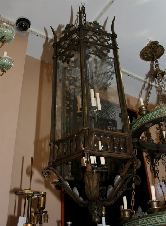 A circa 1900s French bronze lantern with original patina two interior light clusters - ten candelabra sockets.

Measurements:
Height 60