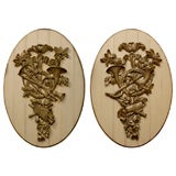 PAIR OF ANTIQUE GILT TROPHIES ON CUSTOM PANELS