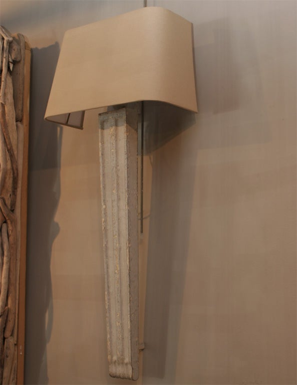 pair of sconces made from architectural parts