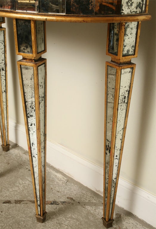 Pair of Gold Gilded Mirrored Demilune Consoles at 1stDibs
