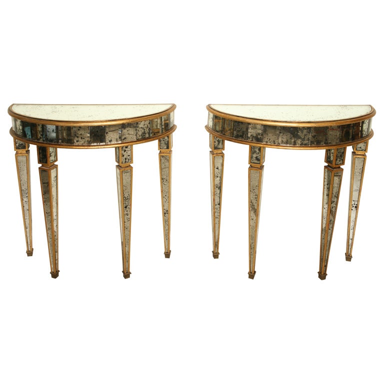 Pair of Gold Gilded Mirrored Demilune Consoles