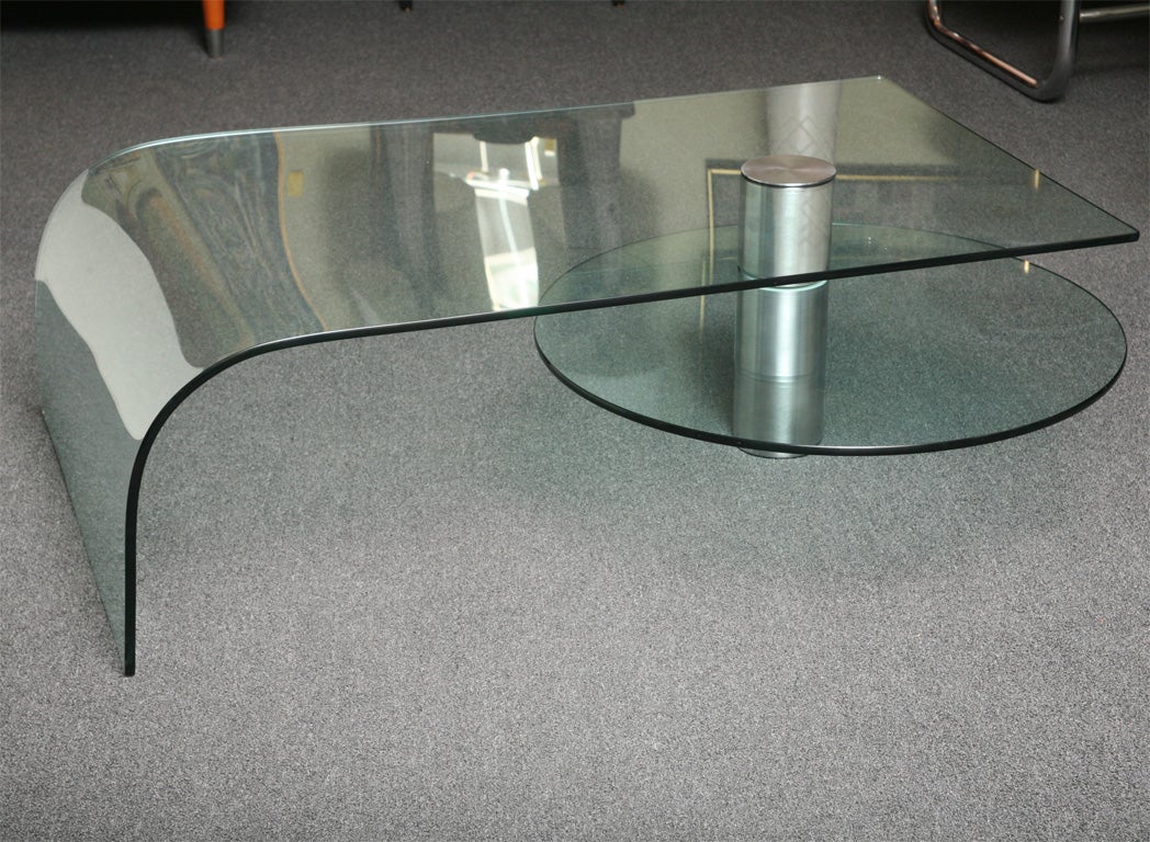 SOLD AUGUST 2009  Quite unique & stunning curved glass Italian coffee table with a rotating circular shelf just perfect for that large coffee table art book!  Fantastic large scale 