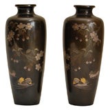 A pair of Bronze Vases