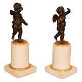 Pair of Louis XVI Gilt and Patinated Bronze Figures of Putti