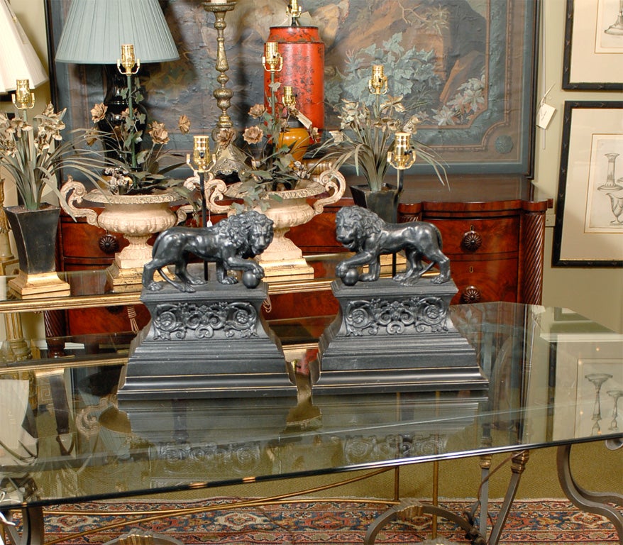 Pair cast iron lion firedogs adapted as lamps