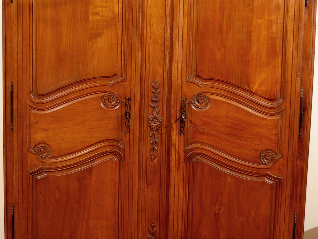 French Louis XV Style, 19th Century Carved Cherrywood Armoire with Four Drawers In Good Condition In Atlanta, GA