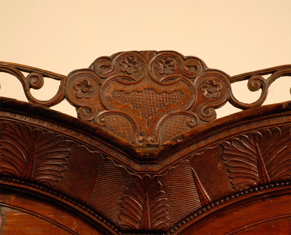 French Late 18th Century Cherry Armoire from Rennes with Hand Carved Décor For Sale 2