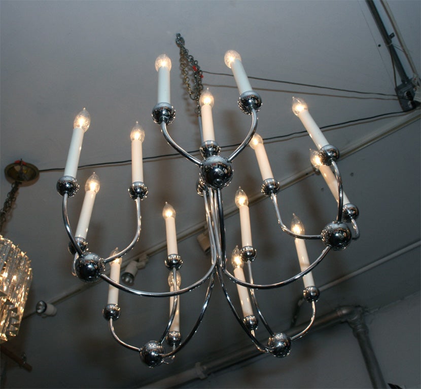 Modern meets traditional, chrome chandelier. Please contact for location. 