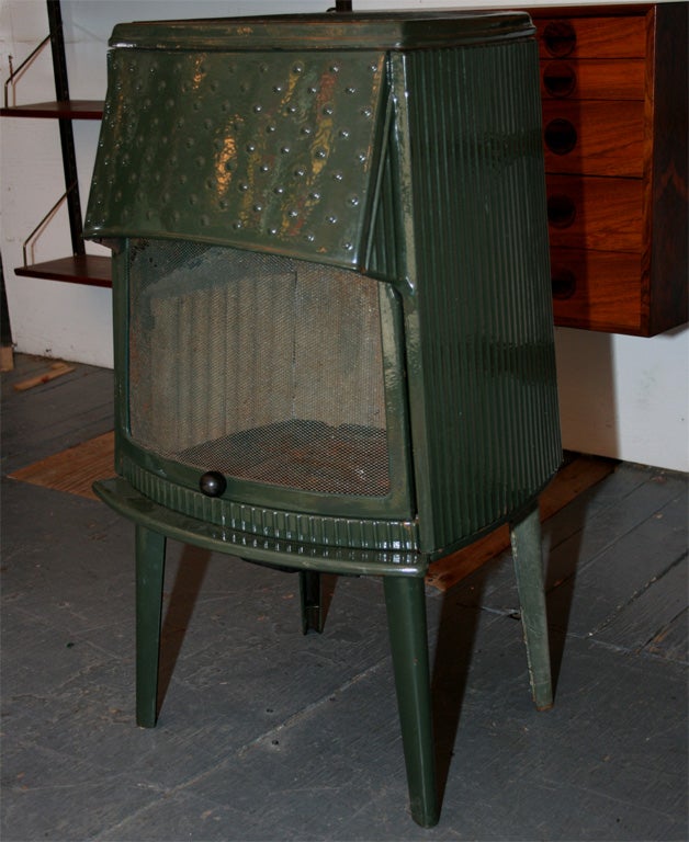 Vintage wood burning stove made by Jotul. Very clean, cast iron with a green enamel. Located at LV2, 113 Stanton St. 212 358-8000