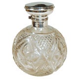 19thC. Sterling top & crystal perfume bottle